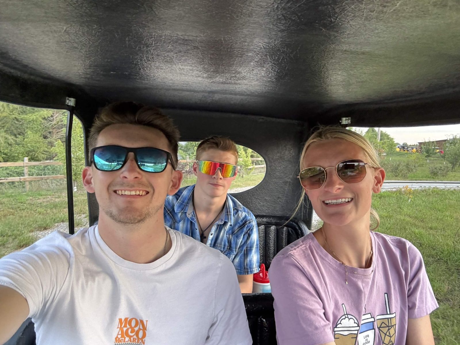Fuzed team photo on a cart